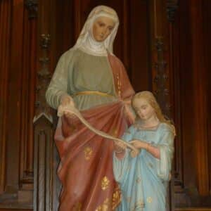 escultura de Santa Ana enseñando Maria a leer